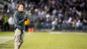 UNIVERSITY PARK, PA - NOVEMBER 26: Head coach Mark Dantonio of the Michigan State Spartans walks onto the field between plays during the first half against the Penn State Nittany Lions on November 26, 2016 at Beaver Stadium in University Park, Pennsylvania. (Photo by Brett Carlsen/Getty Images)
