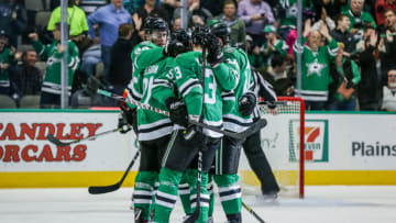 DALLAS, TX - FEBRUARY 27: Dallas Stars center Tyler Seguin (91) celebrates scoring a goal with his teammates during the game between the Dallas Stars and the Calgary Flames on February 27, 2018 at the American Airlines Center in Dallas, TX. Dallas defeats Calgary 2-0. (Photo by Matthew Pearce/Icon Sportswire via Getty Images)