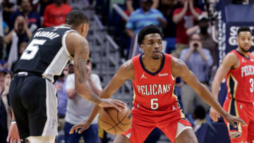 San Antonio Spurs guard Dejounte Murray (5) dribbles against New Orleans Pelicans forward Herbert JonesMandatory Credit: Stephen Lew-USA TODAY Sports