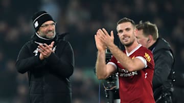LIVERPOOL, ENGLAND - MARCH 03: Jordan Henderson of Liverpool celebrates with Jurgen Klopp, Manager of Liverpool following the Premier League match between Liverpool and Newcastle United at Anfield on March 3, 2018 in Liverpool, England. (Photo by Gareth Copley/Getty Images)