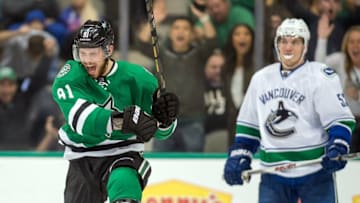 Oct 29, 2015; Dallas, TX, USA; Dallas Stars center Tyler Seguin (91) celebrates the game tying goal scored by left wing Patrick Sharp (not pictured) during the third period against the Vancouver Canucks at the American Airlines Center. The Stars defeat the Canucks 4-3 in overtime. Mandatory Credit: Jerome Miron-USA TODAY Sports