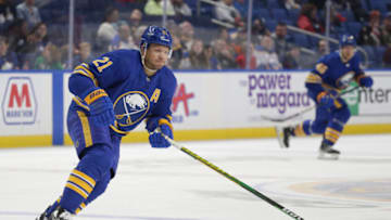 BUFFALO, NEW YORK - SEPTEMBER 27: Kyle Okposo #21 of the Buffalo Sabres skates during the third period against the Philadelphia Flyers at KeyBank Center on September 27, 2022 in Buffalo, New York. (Photo by Joshua Bessex/Getty Images)