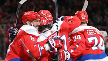 WASHINGTON, DC - FEBRUARY 10: Alex Ovechkin #8 of the Washington Capitals celebrates a goal by teammate T.J. Oshie #77 of the Washington Capitals against the New York Islanders during the second period at Capital One Arena on February 10, 2020 in Washington, DC. (Photo by Patrick Smith/Getty Images)