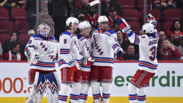 MONTREAL, QC - FEBRUARY 27: Ryan Strome #16 of the New York Rangers (C) celebrates an empty net goal with teammates Alexandar Georgiev #40, Jacob Trouba #8, Marc Staal #18 and Phillip Di Giuseppe #33 against the Montreal Canadiens during the third period at the Bell Centre on February 27, 2020 in Montreal, Canada. The New York Rangers defeated the Montreal Canadiens 5-2. (Photo by Minas Panagiotakis/Getty Images)