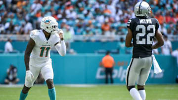 MIAMI, FL - SEPTEMBER 23: DeVante Parker #11 of the Miami Dolphins gets ready for the play during the second quarter against the Oakland Raiders at Hard Rock Stadium on September 23, 2018 in Miami, Florida. (Photo by Mark Brown/Getty Images)