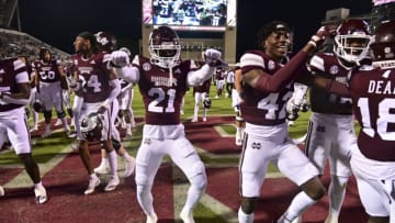 Oct 30, 2021; Starkville, Mississippi, USA; Mississippi State Bulldogs players celebrate after defeating the Kentucky Wildcats at Davis Wade Stadium at Scott Field. Mandatory Credit: Matt Bush-USA TODAY Sports