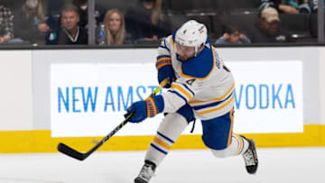 Nov 2, 2021; San Jose, California, USA; Buffalo Sabres defenseman Will Butcher (4) shoots the puck during the first period against the San Jose Sharks at SAP Center at San Jose. Mandatory Credit: Stan Szeto-USA TODAY Sports