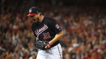 WASHINGTON, DC - OCTOBER 07: Max Scherzer #31 of the Washington Nationals celebrates as he walks back to the dug out after the last out with bases loaded in the seventh inning of game four of the National League Division Series against the Los Angeles Dodgers at Nationals Park on October 07, 2019 in Washington, DC. (Photo by Will Newton/Getty Images)