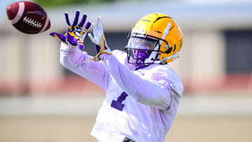 Aug 17, 2020; Baton Rouge, Louisiana, United States; LSU Tigers wide receiver Ja’Marr Chase (7) catches the football during practice at Football Operations Center. Mandatory Credit: LSU Athletics/Pool Photo via USA TODAY Network