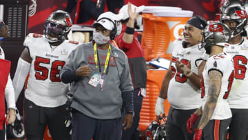 Feb 7, 2020; Tampa, FL, USA; Tampa Bay Buccaneers defensive coordinator Todd Bowles (middle) talks with players during the fourth quarter of Super Bowl LV against the Kansas City Chiefs at Raymond James Stadium. Mandatory Credit: Kim Klement-USA TODAY Sports
