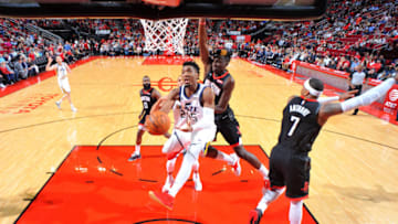 HOUSTON, TX - OCTOBER 24: Donovan Mitchell #45 of the Utah Jazz drives to the basket against Clint Capela #15 of the Houston Rockets on October 24, 2018 at Toyota Center, in Houston, Texas. Copyright 2018 NBAE (Photo by Bill Baptist/NBAE via Getty Images)