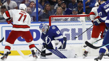 Jun 5, 2021; Tampa, Florida, USA; Tampa Bay Lightning goaltender Andrei Vasilevskiy (88) makes a save against the Carolina Hurricanes during the third period in game four of the second round of the 2021 Stanley Cup Playoffs at Amalie Arena. Mandatory Credit: Kim Klement-USA TODAY Sports