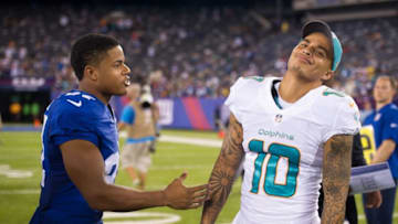 Aug 12, 2016; East Rutherford, NJ, USA; New York Giants wide receiver Sterling Shepard (87) and Miami Dolphins wide receiver Kenny Stills (10) talk after the game at MetLife Stadium. The Miami Dolphins defeat the New York Giants 27-10. Mandatory Credit: William Hauser-USA TODAY Sports