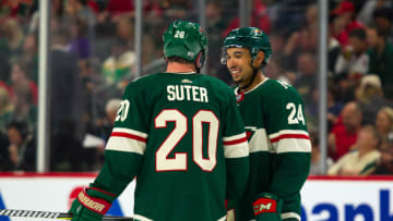 ST. PAUL, MN - SEPTEMBER 23: Minnesota Wild defenseman Matt Dumba (24) (L) laughs with defenseman Ryan Suter (20) during the preseason game between the Colorado Avalanche and the Minnesota Wild on September 23, 2017 at Xcel Energy Center in St. Paul, Minnesota. (Photo by David Berding/Icon Sportswire via Getty Images)