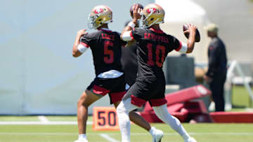 San Francisco 49ers quarterbacks Trey Lance (5) and Jimmy Garoppolo (10) Mandatory Credit: Stan Szeto-USA TODAY Sports