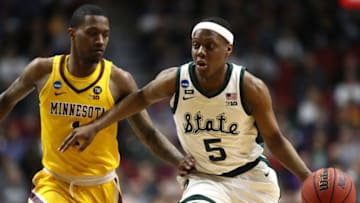 DES MOINES, IOWA - MARCH 23: Cassius Winston #5 of the Michigan State Spartans drives to the basket against Dupree McBrayer #1 of the Minnesota Golden Gophers during the first half in the second round game of the 2019 NCAA Men's Basketball Tournament at Wells Fargo Arena on March 23, 2019 in Des Moines, Iowa. (Photo by Jamie Squire/Getty Images)