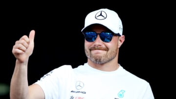 SPIELBERG, AUSTRIA - JUNE 27: Valtteri Bottas of Finland and Mercedes GP gives the crowd a thumbs up from the fan stage during previews ahead of the F1 Grand Prix of Austria at Red Bull Ring on June 27, 2019 in Spielberg, Austria. (Photo by Charles Coates/Getty Images)