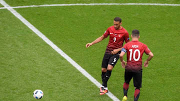 PARIS, FRANCE - JUNE 12: Cenk Tosun (L) and Arda Turan (R) of Turkey kick off during the UEFA EURO 2016 Group D match between Turkey and Croatia at Parc des Princes on June 12, 2016 in Paris, France. (Photo by Matthias Hangst/Getty Images)