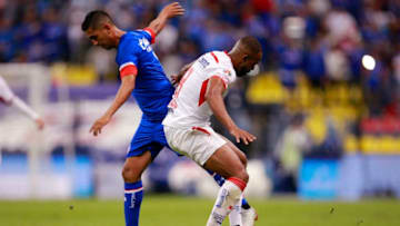MEXICO CITY, MEXICO - AUGUST 22: Elias Hernandez (L) of Cruz Azul fights for the ball with William da Silva (R) of Toluca during the 6th round match between Cruz Azul and Toluca as part of the Torneo Apertura 2018 Liga MX at Azteca Stadium on August 22, 2018 in Mexico City, Mexico. (Photo by Mauricio Salas/Jam Media/Getty Images)