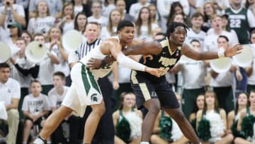 EAST LANSING, MI - JANUARY 24: Caleb Swanigan #50 of the Purdue Boilermakers post up Miles Bridges #22 of the Michigan State Spartans in the first half at the Breslin Center on January 24, 2017 in East Lansing, Michigan. (Photo by Rey Del Rio/Getty Images)