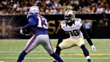 Aug 22, 2015; New Orleans, LA, USA; New Orleans Saints cornerback Damian Swann (38) defends against New England Patriots wide receiver Brandon Gibson (13) during the second quarter of a preseason game at the Mercedes-Benz Superdome. Mandatory Credit: Derick E. Hingle-USA TODAY Sports
