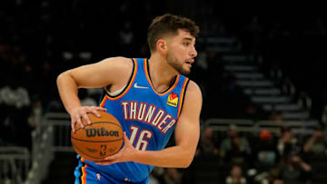 Ty Jerome #16 of the Oklahoma City Thunder dribbles the ball against the Milwaukee Bucks in the second half during a preseason game at Fiserv Forum on October 10, 2021 in Milwaukee, Wisconsin. (Photo by Patrick McDermott/Getty Images)