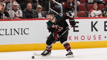GLENDALE, AZ - FEBRUARY 24: Arizona Coyotes right wing Conor Garland (83) skates with the puck during the NHL hockey game between the Winnipeg Jets and the Arizona Coyotes on February 24, 2019 at Gila River Arena in Glendale, Arizona. (Photo by Kevin Abele/Icon Sportswire via Getty Images)