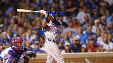 Jul 18, 2016; Chicago, IL, USA; New York Mets left fielder Michael Conforto (30) hits a single during the ninth inning against the Chicago Cubs at Wrigley Field. Chicago won 5-1. Mandatory Credit: Dennis Wierzbicki-USA TODAY Sports