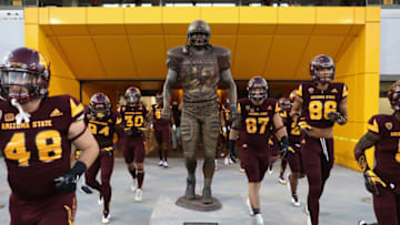 TEMPE, AZ - SEPTEMBER 23: Arizona State Sun Devils players run past the Pat Tillman statue before the college football game against the Oregon Ducks at Sun Devil Stadium on September 23, 2017 in Tempe, Arizona. (Photo by Christian Petersen/Getty Images)