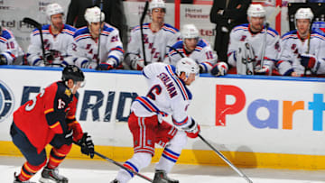 SUNRISE, FL - DECEMBER 31: Anton Stralman #6 of the New York Rangers skates with the puck against Aleksander Barkov #16 of the Florida Panthers at the BB&T Center on December 31, 2013 in Sunrise, Florida. (Photo by Jeffrey R. Sanzare/NHLI via Getty Images)