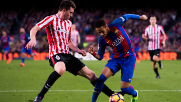 BARCELONA, SPAIN - FEBRUARY 04: Neymar Santos Jr (R) of FC Barcelona dribbles Aymeric Laporte (L) of Athletic Club during the La Liga match between FC Barcelona and Athletic Club at Camp Nou stadium on February 4, 2017 in Barcelona, Spain. (Photo by Alex Caparros/Getty Images)