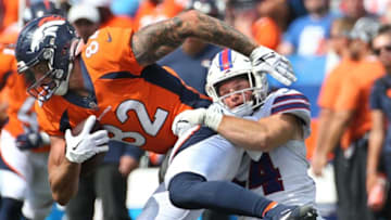 Bills linebacker Baylon Spector (54) hits Denver tight end Eric Saubert at the line for no gain in the second half of the Bills preseason game against Denver Saturday, Aug. 20, 2022 at Highmark Stadium.Sd 082022 Bills 72 Spts