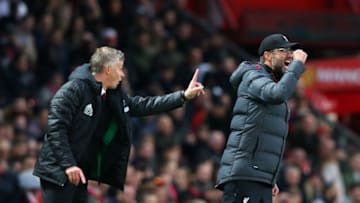 MANCHESTER, ENGLAND - OCTOBER 20: Ole Gunnar Solskjaer, Manager of Manchester United and Jurgen Klopp, Manager of Liverpool gives their side instructions during the Premier League match between Manchester United and Liverpool FC at Old Trafford on October 20, 2019 in Manchester, United Kingdom. (Photo by Alex Livesey/Getty Images)