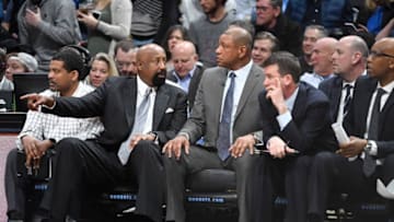 DENVER, CO - FEBRUARY 27: Doc Rivers of the LA Clippers talks with his coaches during the game against the Denver Nuggets at Pepsi Center on February 27, 2018 in Denver, Colorado.NOTE TO USER: User expressly acknowledges and agrees that, by downloading and or using this photograph, User is consenting to the terms and conditions of the Getty Images License Agreement. (Photo by Justin Tafoya/Getty Images)