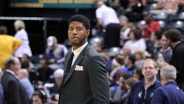 Oct 7, 2014; Indianapolis, IN, USA; Indiana Pacers forward Paul George watches the Pacers warm up against the Minnesota Timberwolves at Bankers Life Fieldhouse. Mandatory Credit: Brian Spurlock-USA TODAY Sports