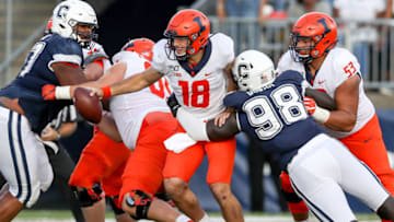 EAST HARTFORD, CT - SEPTEMBER 07: Illinois Fighting Illini quarterback Brandon Peters (18) gets sacked by UConn Huskies defensive lineman Lwal Uguak (98) during the game between the Illinois Fighting Illini and the UConn Huskies played on September 07, 2019 at Pratt & Whitney Stadium in East Hartford, CT. (Photo by Steve Nurenberg/Icon Sportswire via Getty Images)