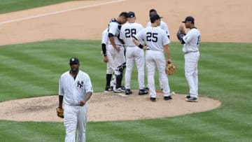 Aug 6, 2016; Bronx, NY, USA; New York Yankees starting pitcher CC Sabathia (52) heads to the dugout after being relieved during the sixth inning against the Cleveland Indians at Yankee Stadium. Mandatory Credit: Anthony Gruppuso-USA TODAY Sports