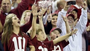 Dec 6, 2014; Atlanta, GA, USA; Alabama Crimson Tide fans celebrate after the 2014 SEC Championship Game against the Missouri Tigers at the Georgia Dome. Alabama defeated Missouri 42-13. Mandatory Credit: Dale Zanine-USA TODAY Sports