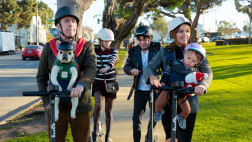 Family Switch - (L to R) Ed Helms as Bill, Emma Myers as CC, Brady Noon as Wyatt, Jennifer Garner as Jess, and Lincoln Alex Sykes and Theodore Brian Sykes as Baby Miles, in Family Switch. Cr. Colleen Hayes/Netflix © 2023.