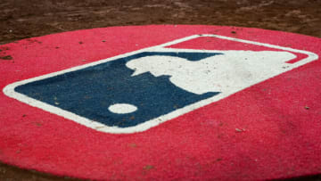 CINCINNATI, OHIO - JULY 05: A general view of the MLB logo on the on-deck circle during the game between the New York Mets and the Cincinnati Reds at Great American Ball Park on July 05, 2022 in Cincinnati, Ohio. (Photo by Dylan Buell/Getty Images)