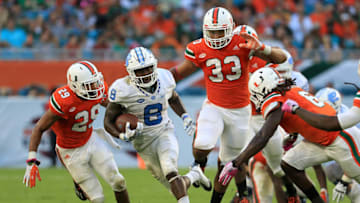 MIAMI GARDENS, FL - OCTOBER 15: T.J. Logan