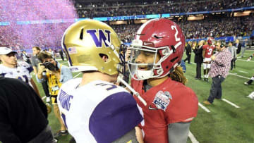 Dec 31, 2016; Atlanta, GA, USA; Alabama Crimson Tide quarterback Jalen Hurts (2) shakes hands with Washington Huskies quarterback Jake Browning (3) after the 2016 CFP semifinal at the Peach Bowl at the Georgia Dome. Alabama won 24-7. Mandatory Credit: John David Mercer-USA TODAY Sports