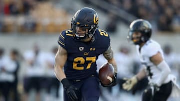 BERKELEY, CA - NOVEMBER 24: Ashtyn Davis #27 of the California Golden Bears returns an interception for a touchdown against the Colorado Buffaloes at California Memorial Stadium on November 24, 2018 in Berkeley, California. (Photo by Ezra Shaw/Getty Images)