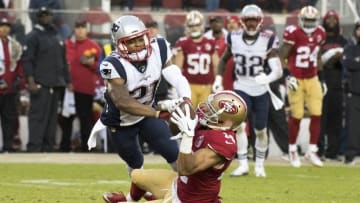 November 20, 2016; Santa Clara, CA, USA; San Francisco 49ers wide receiver Chris Harper (14) catches the football against New England Patriots cornerback Malcolm Butler (21) during the fourth quarter at Levi