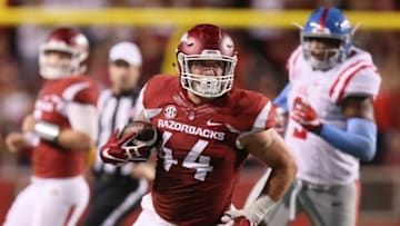 Oct 15, 2016; Fayetteville, AR, USA; Arkansas Razorbacks tight end Austin Cantrell (44) runs after a catch in the fourth quarter against the Ole Miss Rebels at Donald W. Reynolds Razorback Stadium. Arkansas defeated Ole Miss 34-30. Mandatory Credit: Nelson Chenault-USA TODAY Sports