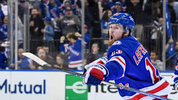 May 11, 2022; New York, New York, USA; New York Rangers left wing Alexis Lafrenire (13) celebrates his goal against the Pittsburgh Penguins during the second period in game five of the first round of the 2022 Stanley Cup Playoffs at Madison Square Garden. Mandatory Credit: Dennis Schneidler-USA TODAY Sports