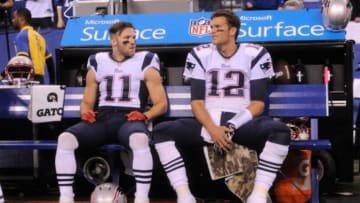 Nov 16, 2014; Indianapolis, IN, USA; Patriots receiver Julian Edelman (11) and quarterback Tom Brady (12) before their start of their game against the Colts at Lucas Oil Stadium. Mandatory Credit: Thomas J. Russo-USA TODAY Sports