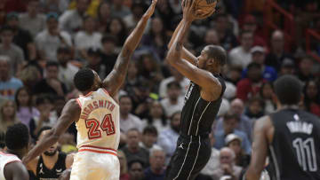 Brooklyn Nets forward Kevin Durant (7) scores over Miami Heat forward Haywood Highsmith( Michael Laughlin-USA TODAY Sports)
