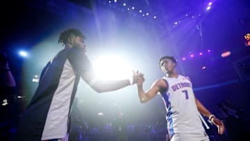 DETROIT, MI - MARCH 26: Reggie Bullock #25 and Stanley Johnson #7 of the Detroit Pistons exchange hand shakes during team introductions prior to the game against the Los Angeles Lakers on March 26, 2018 at Little Caesars Arena in Detroit, Michigan. NOTE TO USER: User expressly acknowledges and agrees that, by downloading and/or using this photograph, User is consenting to the terms and conditions of the Getty Images License Agreement. Mandatory Copyright Notice: Copyright 2018 NBAE (Photo by Brian Sevald/NBAE via Getty Images)