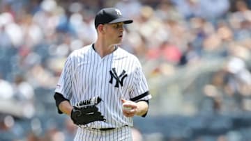 NEW YORK, NEW YORK - JULY 21: James Paxton #65 of the New York Yankees looks on in the third inning against the Colorado Rockies at Yankee Stadium on July 21, 2019 in New York City. (Photo by Mike Stobe/Getty Images)